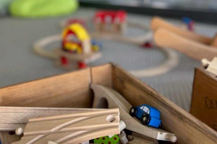 You are welcome to bring your children with you.  We have a lovingly furnished play corner waiting for them.